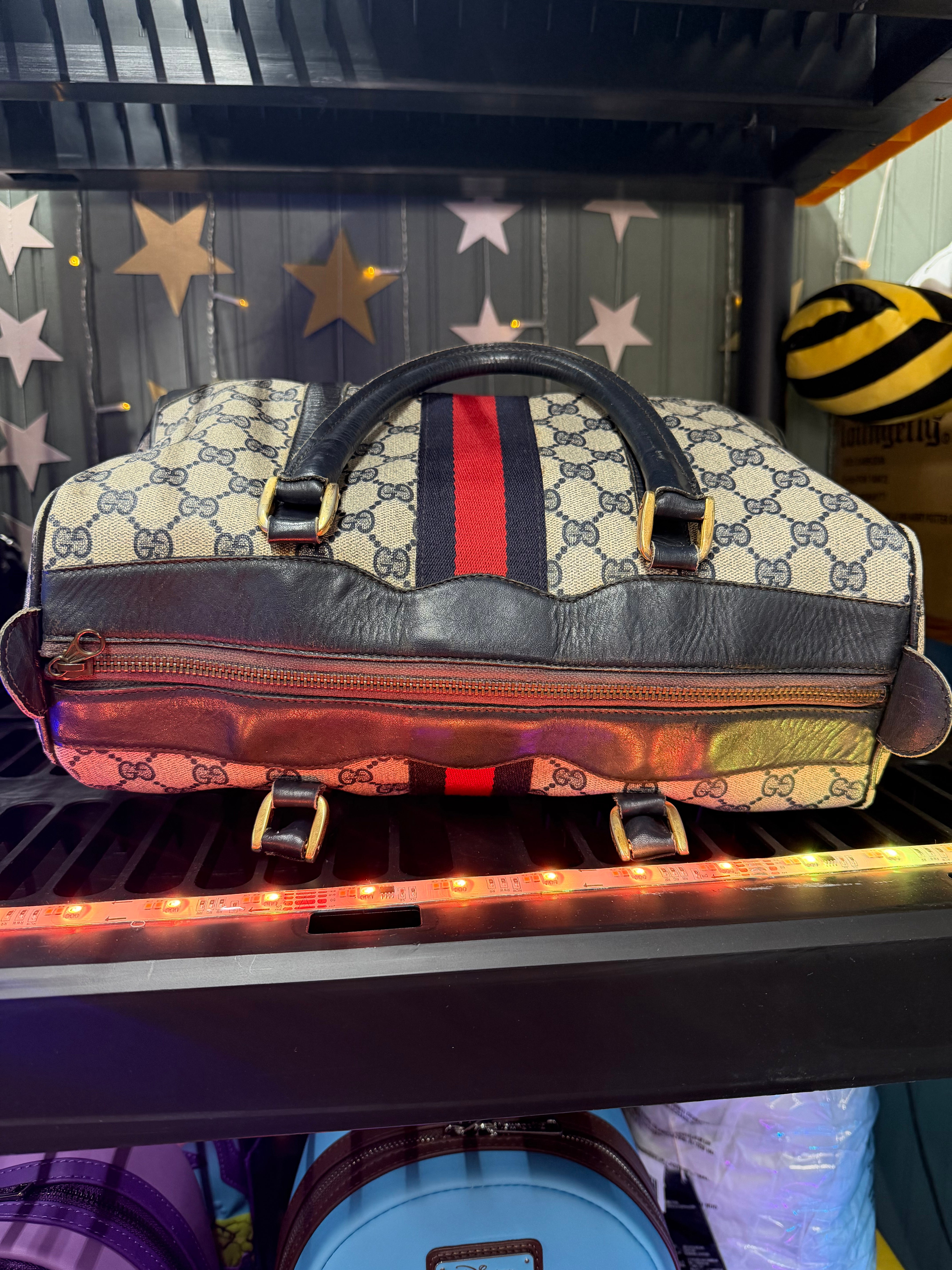 Gucci
GG Supreme Boston