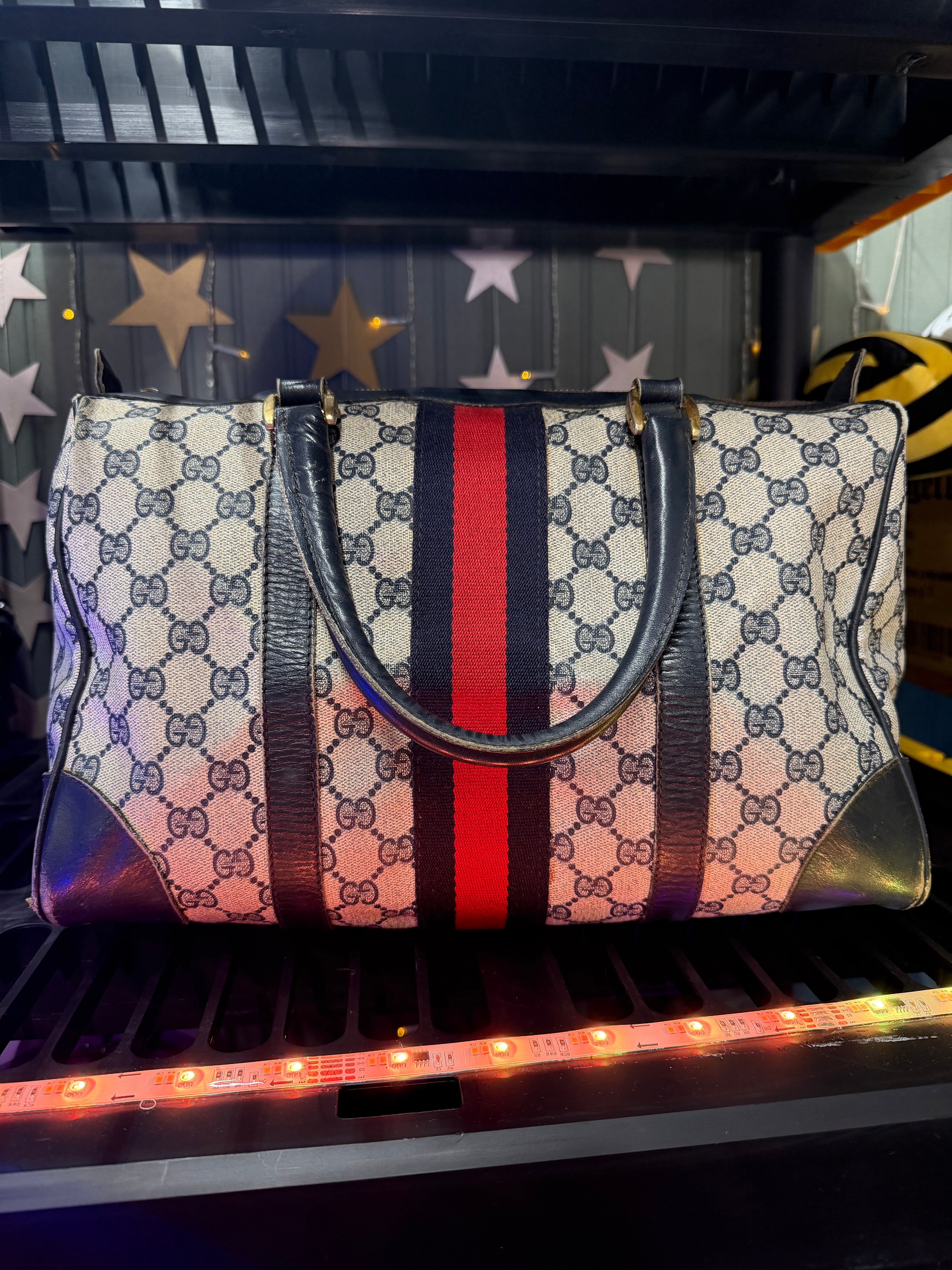 Gucci
GG Supreme Boston